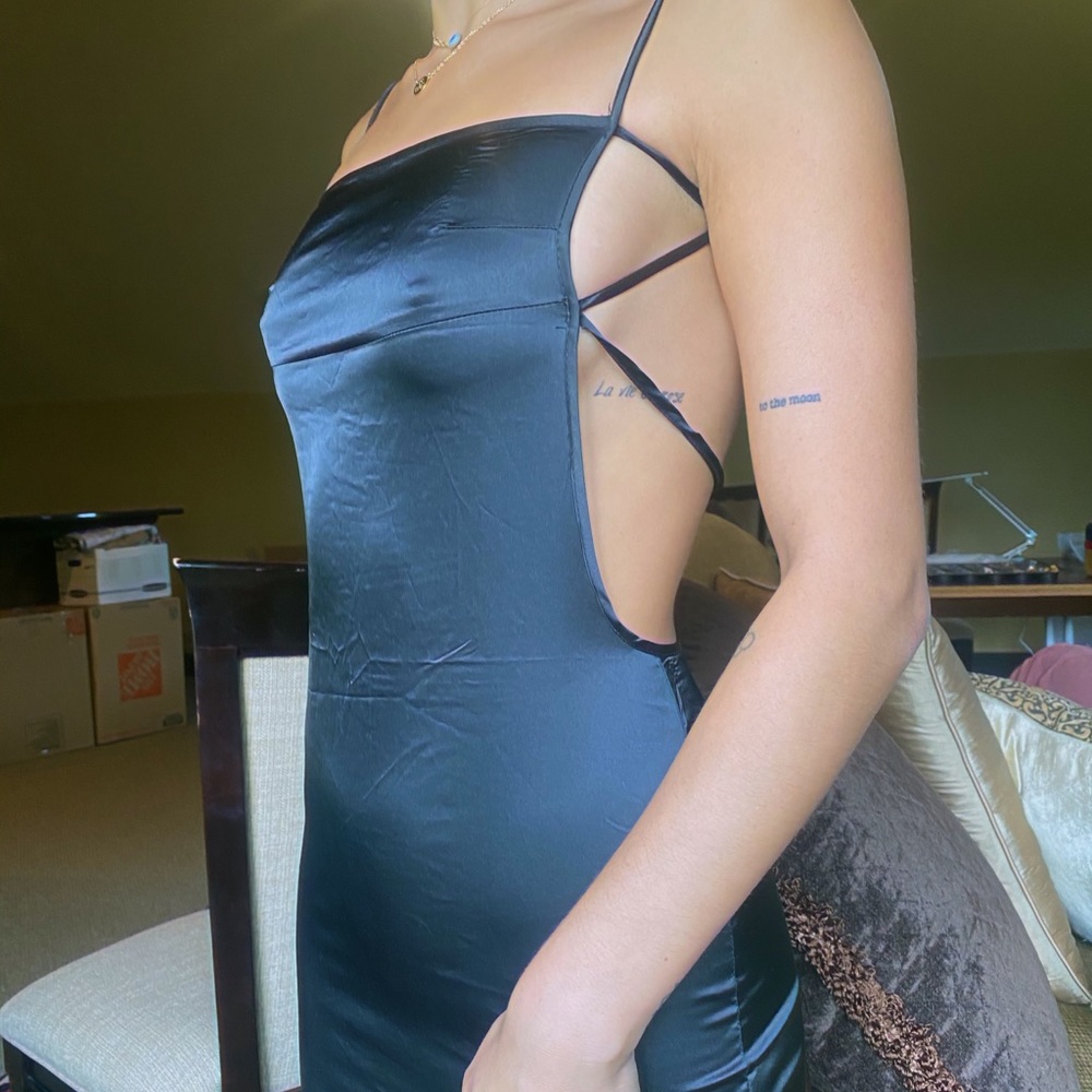 Backless black mini dress